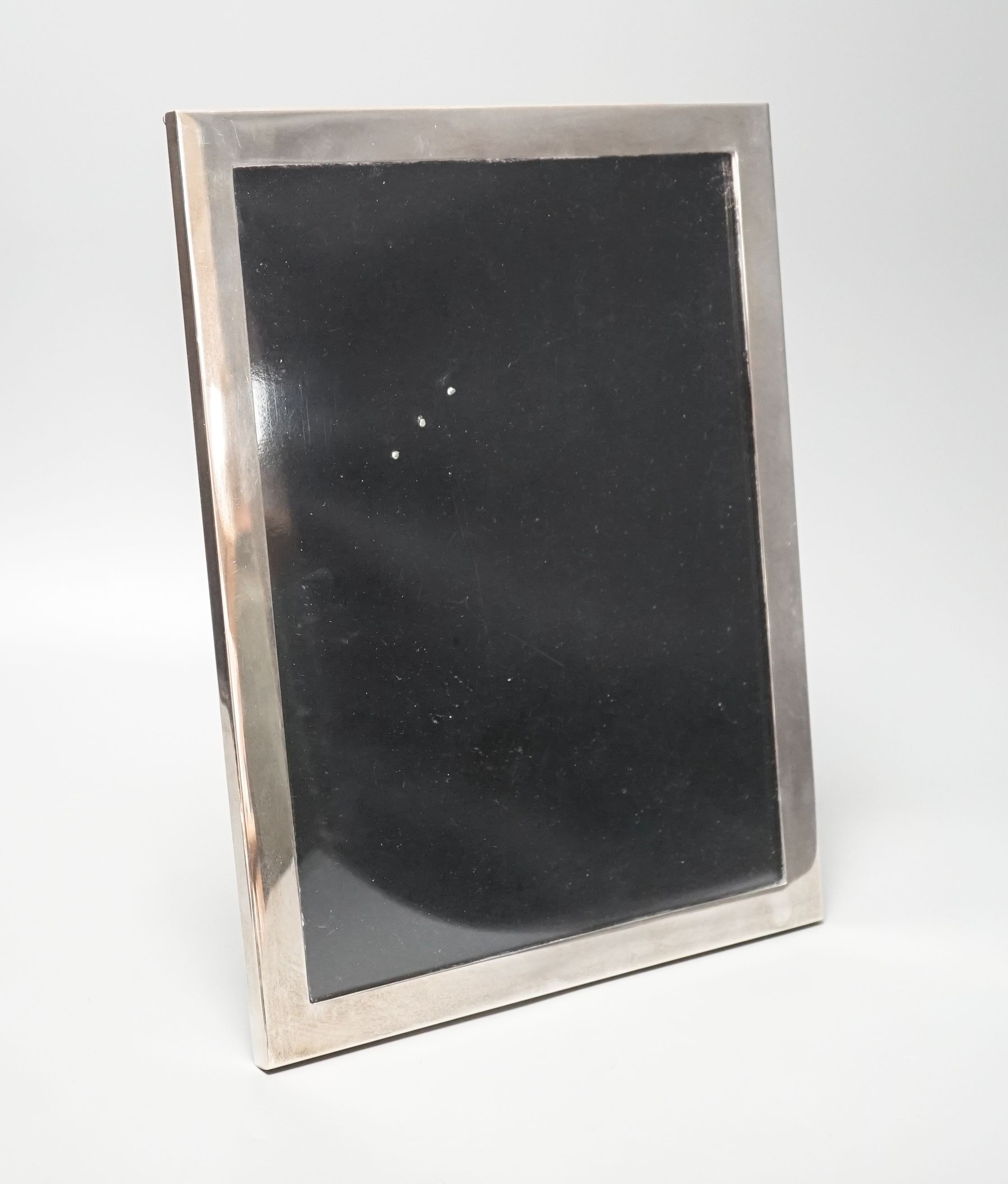 A large modern Tiffany & Co sterling mounted rectangular photograph frame, 33.7cm.
